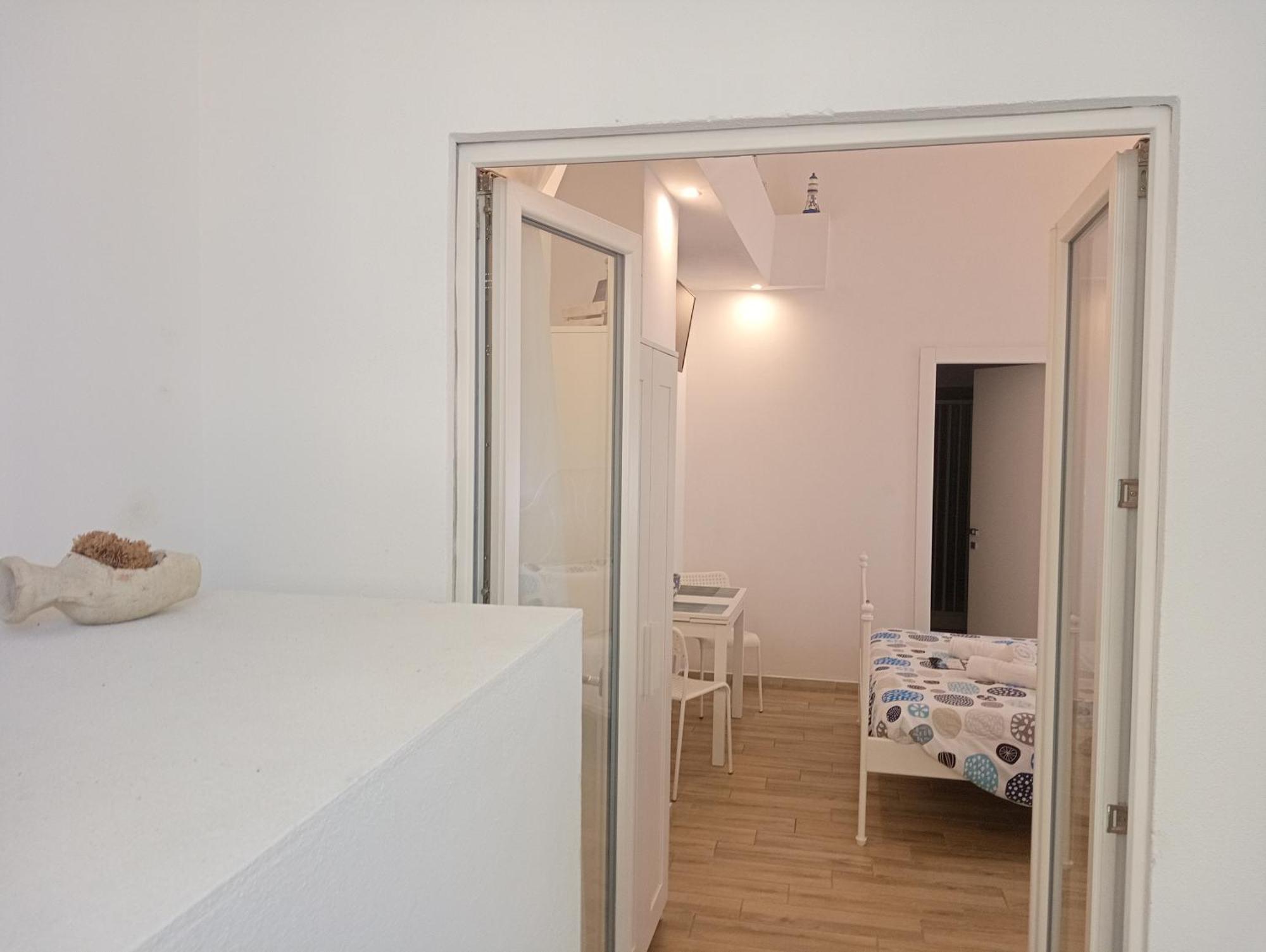 White Shell Rooms Accomodation Fast Check-In Alghero Kültér fotó